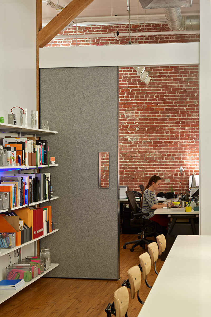 studio vara workplace odopod office bookshelves workspace 