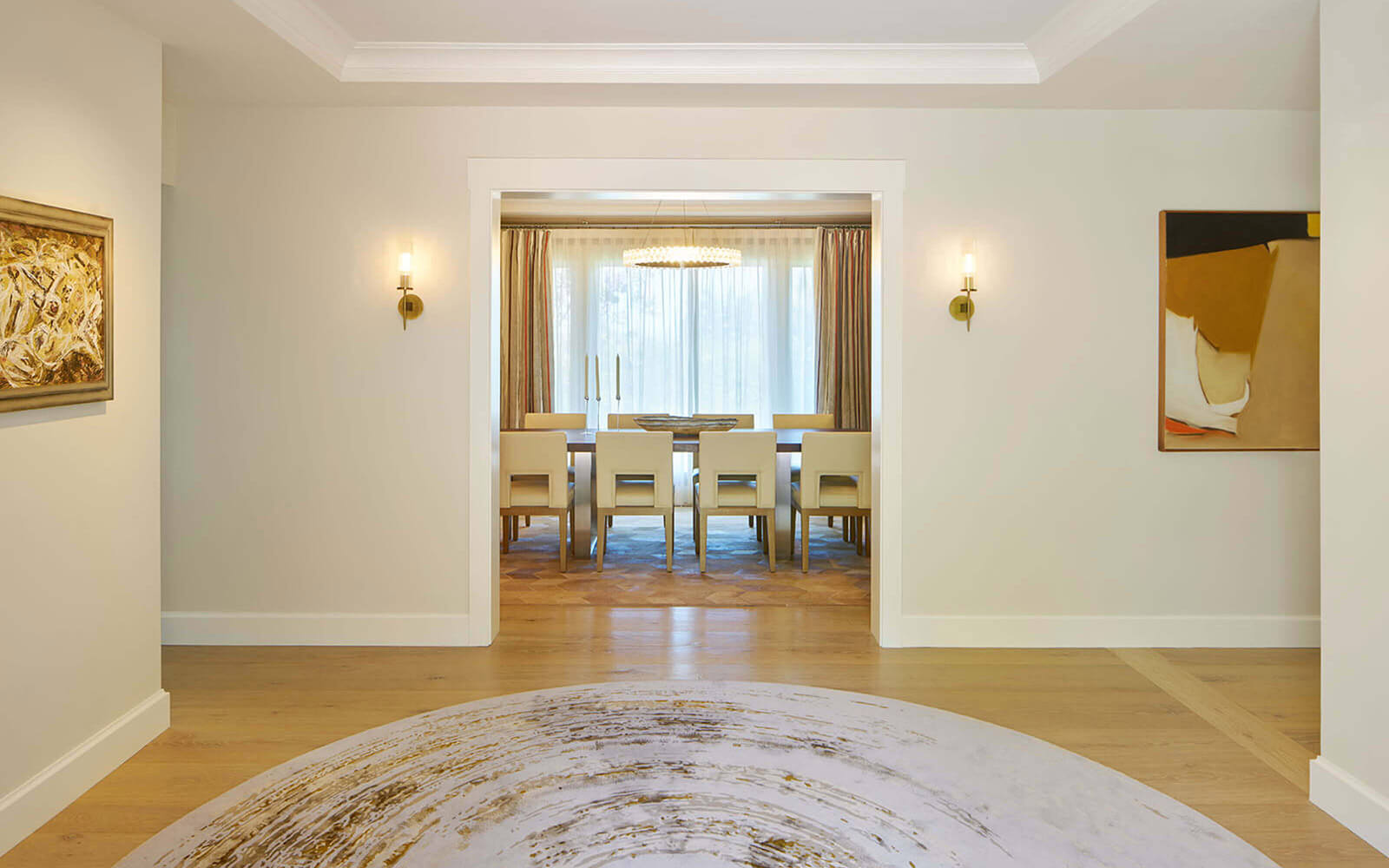 Black Mountain residence: updated Dining Room with grass cloth wall covering, a slab walnut table, and creamy leather chairs